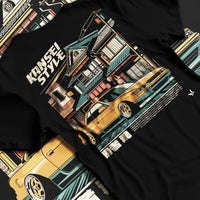 Black T-shirt laid flat with natural fabric folds, featuring racing drift jdm japanese street performance motorsport kansei.