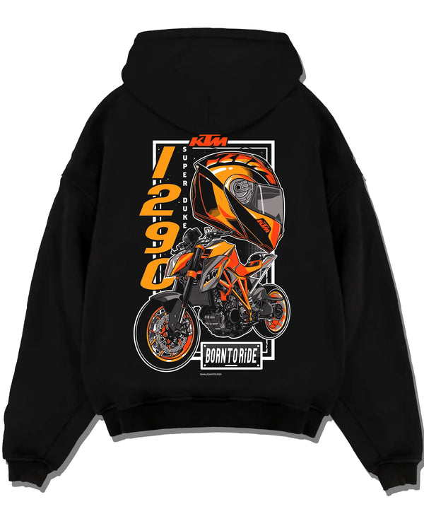Black pullover hoodie laid flat on a white background, featuring KTM racing street performance motorsport automotive graphic.