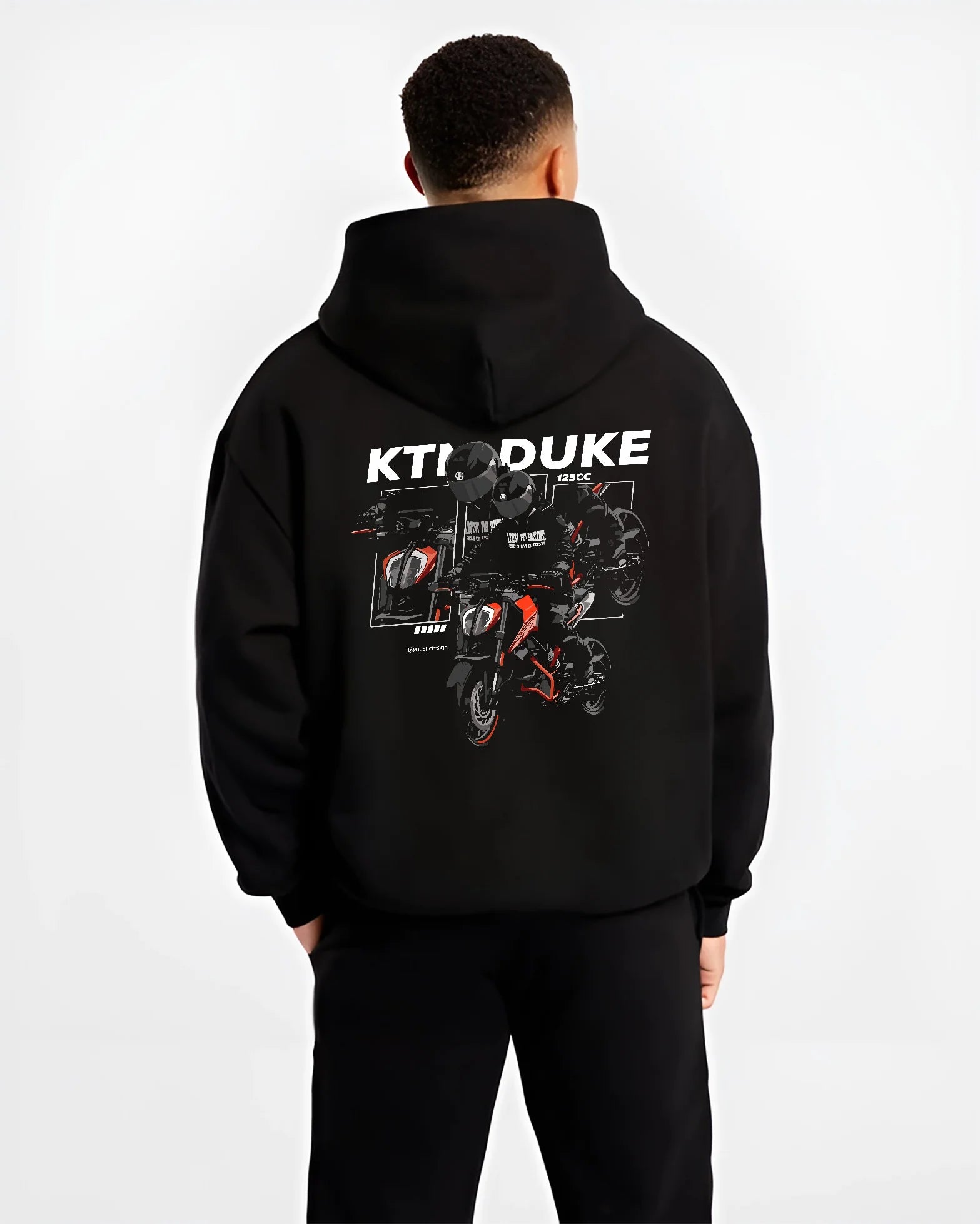 Black hoodie worn by a male model, back view, featuring KTM rs racing street performance motorsport automotive enthusiast graphic.