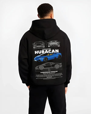 Black hoodie worn by a male model, back view, featuring SKYLINE racing street performance motorsport automotive enthusiast graphic.