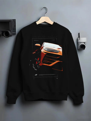 Black crewneck sweatshirt on a hanger against a grey wall, featuring Lamborghini street racing performance motorsport graphic.