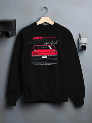 Black crewneck sweatshirt on a hanger against a grey wall, featuring NISSAN SKYLINE racing jdm widebody liberty walk street graphic.