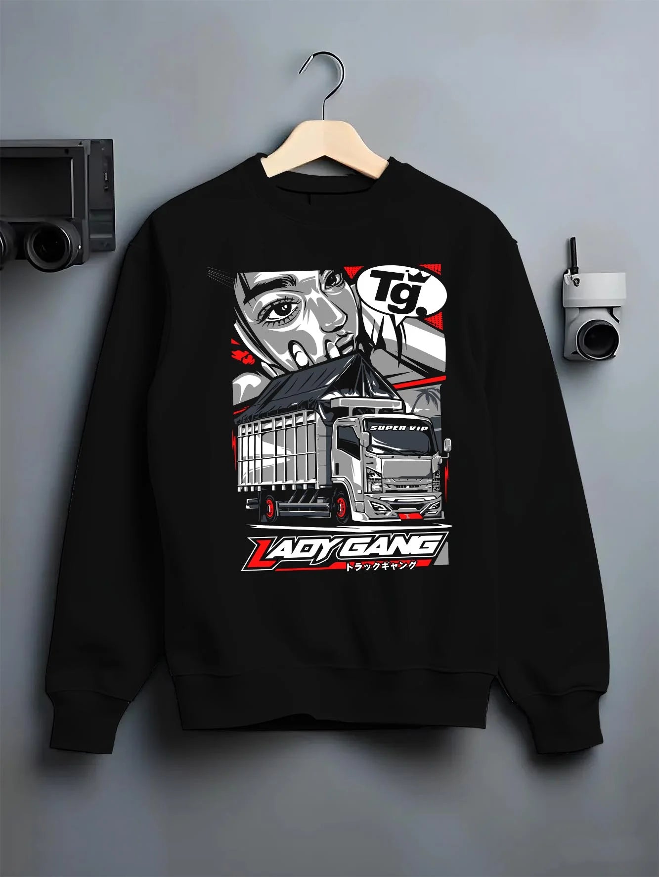 Black crewneck sweatshirt on a hanger against a grey wall, featuring japanese street enthusiast racing performance graphic.