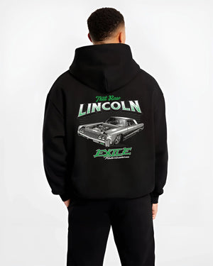 Black hoodie worn by a male model, back view, featuring tuner classic racing street performance motorsport automotive graphic.