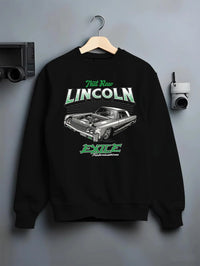 Black crewneck sweatshirt on a hanger against a grey wall, featuring tuner classic racing street performance motorsport graphic.
