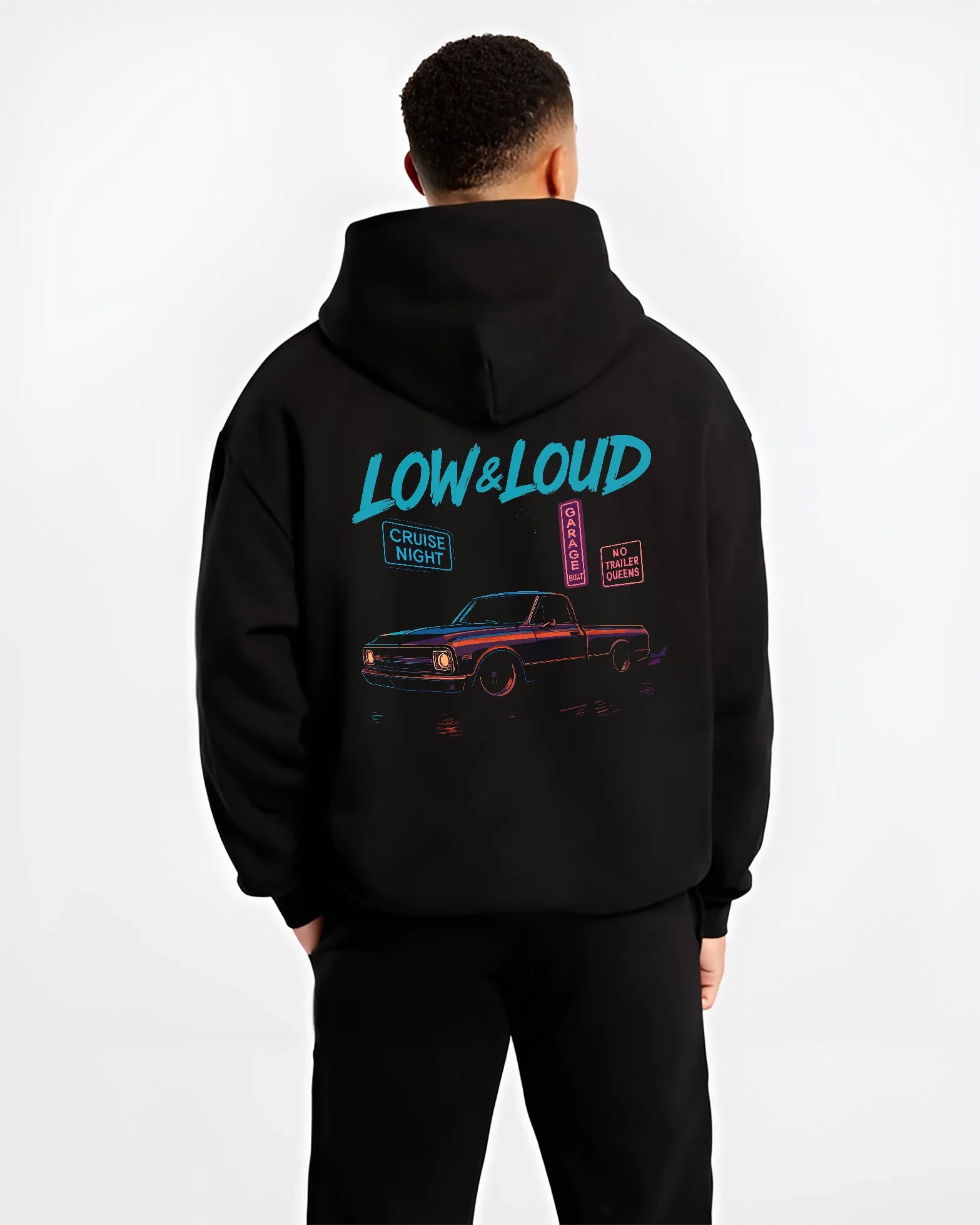 Black hoodie worn by a male model, back view, featuring street retro classic racing performance motorsport automotive graphic.