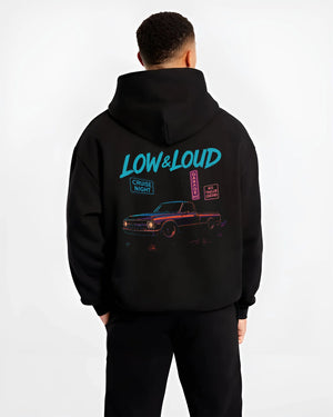 Black hoodie worn by a male model, back view, featuring street retro classic racing performance motorsport automotive graphic.