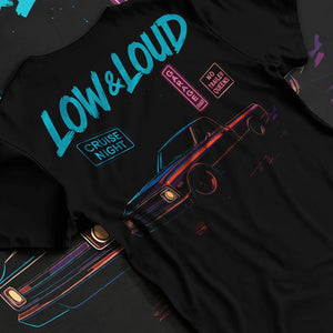 Black T-shirt laid flat with natural fabric folds, featuring street retro classic racing performance motorsport automotive graphic.