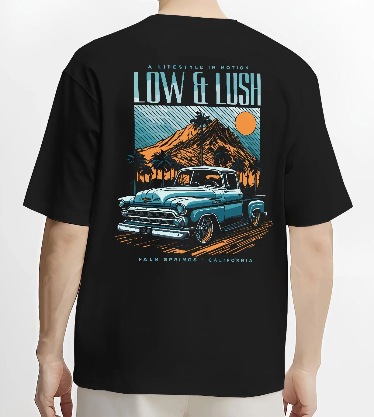 Black T-shirt worn by a male model, back view, featuring Chevrolet retro classic racing street performance motorsport graphic.