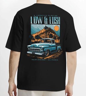 Black T-shirt worn by a male model, back view, featuring Chevrolet retro classic racing street performance motorsport graphic.