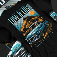 Black T-shirt laid flat with natural fabric folds, featuring Chevrolet retro classic racing street performance motorsport graphic.