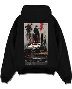 Black pullover hoodie laid flat on a white background, featuring Toyota Supra racing jdm japanese tuning street enthusiast graphic.