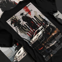 Black T-shirt laid flat with natural fabric folds, featuring Toyota Supra racing jdm japanese tuning street enthusiast graphic.