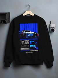 Black crewneck sweatshirt on a hanger against a grey wall, featuring BMW M4 gt3 rs turbo racing motorsport german street graphic.