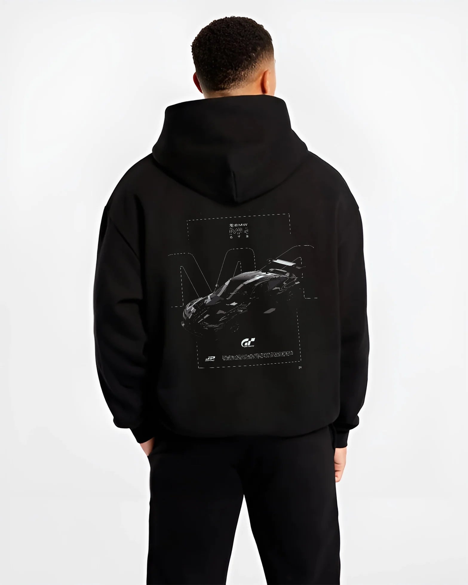 Black hoodie worn by a male model, back view, featuring BMW M4 gt3 racing race gran turismo street performance graphic.