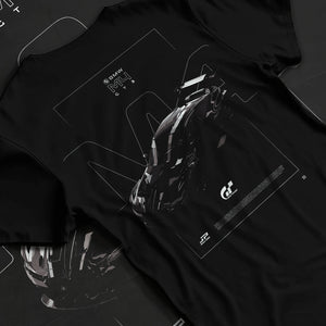 Black T-shirt laid flat with natural fabric folds, featuring BMW M4 gt3 racing race gran turismo street performance graphic.