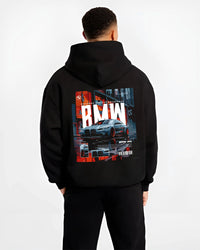 Black hoodie worn by a male model, back view, featuring BMW M4 rs turbo racing motorsport track german street graphic.