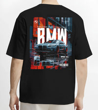 Black T-shirt worn by a male model, back view, featuring BMW M4 rs turbo racing motorsport track german street graphic.