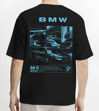 Black T-shirt worn by a male model, back view, featuring BMW M5 rs turbo racing motorsport euro german street graphic.