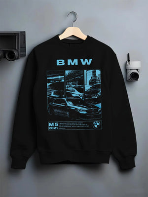 Black crewneck sweatshirt on a hanger against a grey wall, featuring BMW M5 rs turbo racing motorsport euro german street graphic.