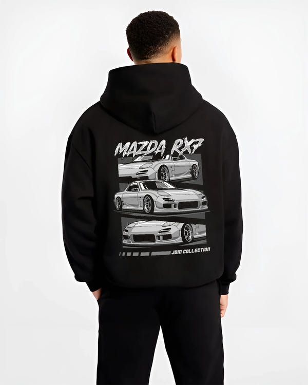Black hoodie worn by a male model, back view, featuring Mazda RX--7 rx 7 racing drift jdm japanese street graphic.