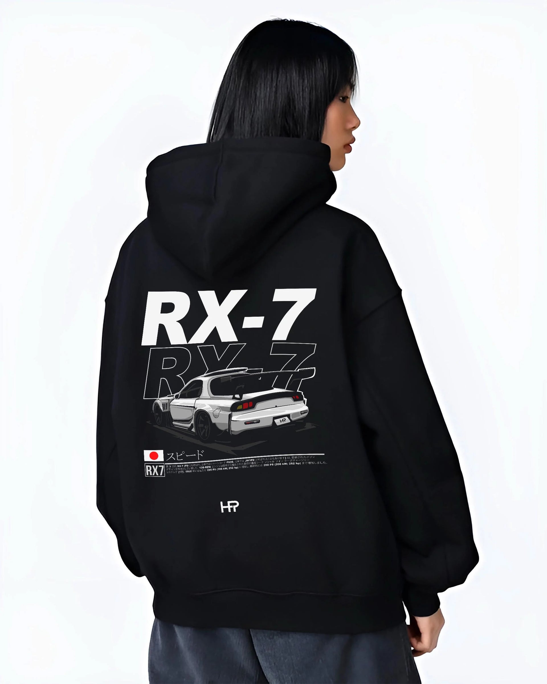 Black hoodie worn by a female model, back view, featuring Mazda RX--7 rx 7 racing drift jdm japanese street graphic mazr2.