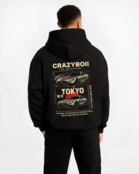 Black hoodie worn by a male model, back view, featuring Mercedes-Benz drift euro german street enthusiast racing graphic.