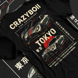 Black T-shirt laid flat with natural fabric folds, featuring Mercedes-Benz drift euro german street enthusiast racing graphic.