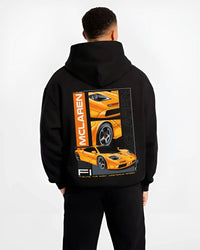 Black hoodie worn by a male model, back view, featuring McLaren 720S rs racing enthusiast street performance motorsport graphic.