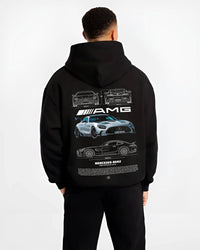 Black hoodie worn by a male model, back view, featuring Mercedes-Benz AMG rs racing motorsport street performance merc9.