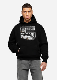 Black hoodie worn by a male model, front view, featuring street retro vintage racing performance motorsport automotive graphic.