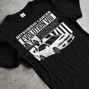 Black T-shirt laid flat with natural fabric folds, featuring street retro vintage racing performance motorsport automotive graphic.