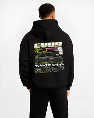 Black hoodie worn by a male model, back view, featuring street retro racing performance motorsport automotive enthusiast graphic.