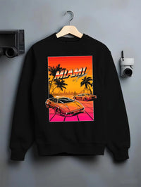 Black crewneck sweatshirt on a hanger against a grey wall, featuring street retro racing performance motorsport automotive miams1.