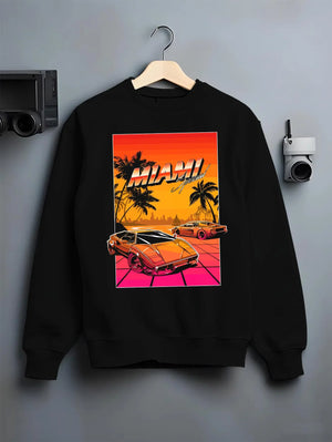 Black crewneck sweatshirt on a hanger against a grey wall, featuring street retro racing performance motorsport automotive miams1.