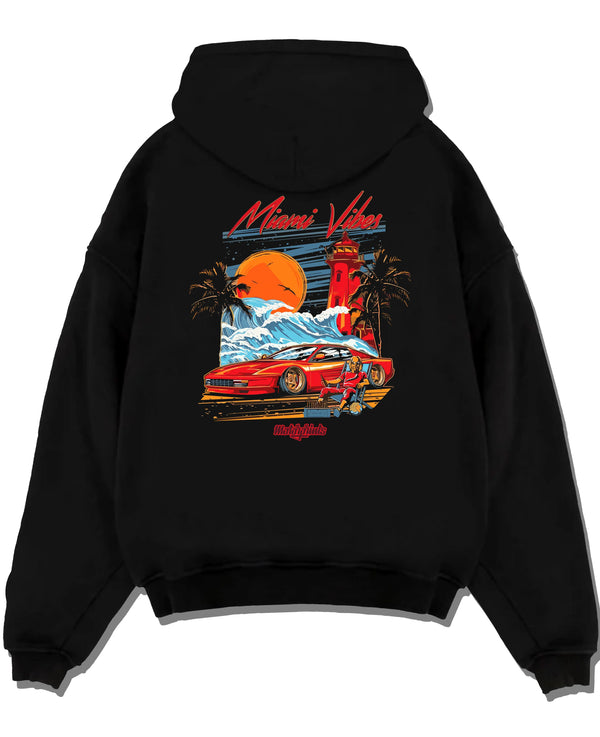 Black pullover hoodie laid flat on a white background, featuring street retro racing performance motorsport automotive miamv1.