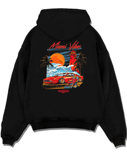 Black pullover hoodie laid flat on a white background, featuring street retro racing performance motorsport automotive miamv1.