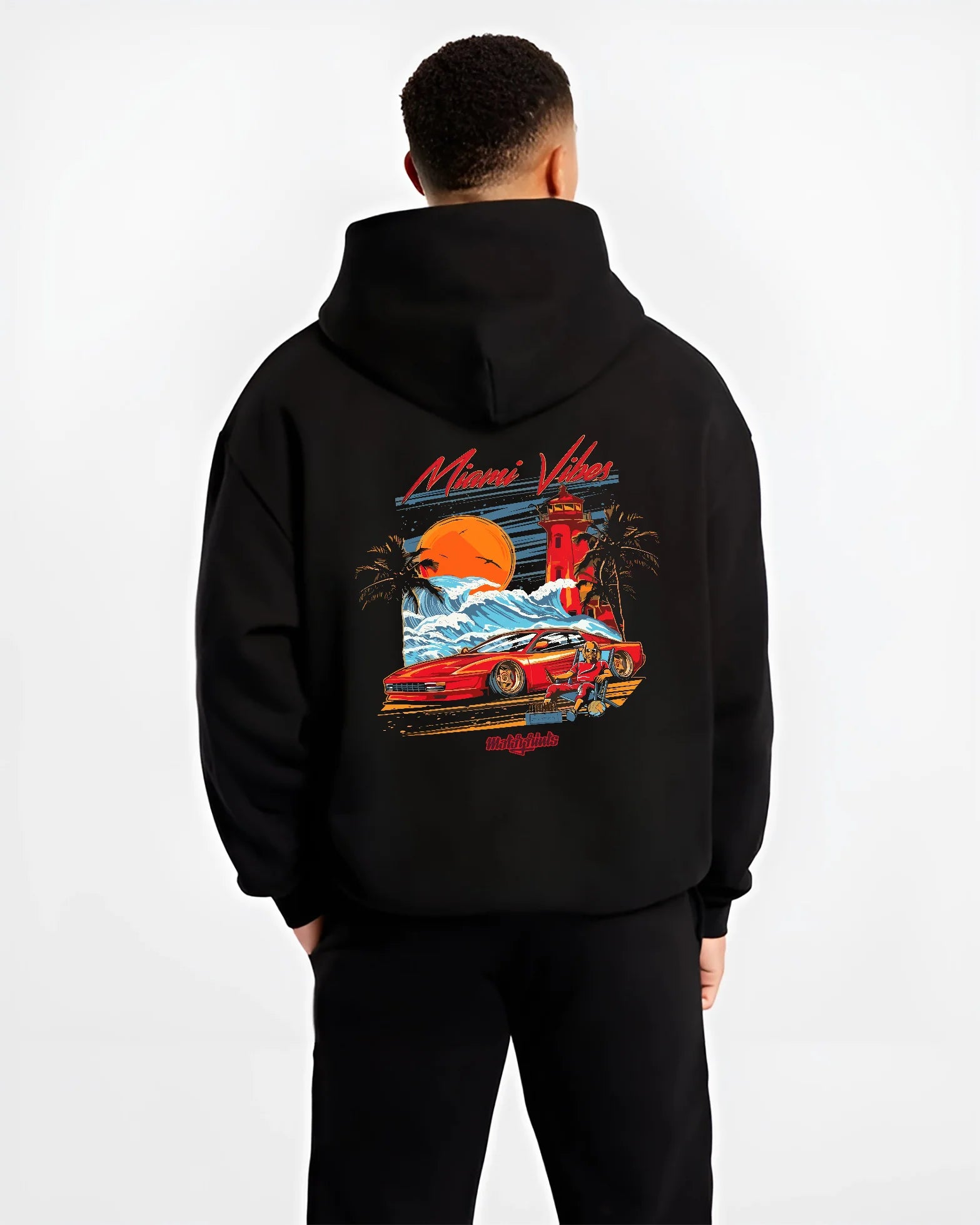 Black hoodie worn by a male model, back view, featuring street retro racing performance motorsport automotive enthusiast miamv1.