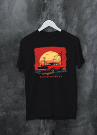 Black crewneck T-shirt on a hanger against a grey wall, featuring racing drag american muscle street vintage classic graphic.