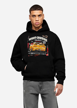 Black hoodie worn by a male model, front view, featuring racing drift jdm japanese tokyo street tokyo drift enthusiast graphic.