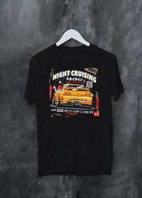 Black crewneck T-shirt on a hanger against a grey wall, featuring racing drift jdm japanese tokyo street tokyo drift graphic.