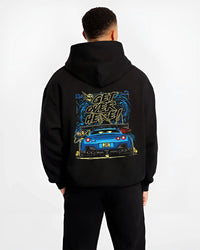Black hoodie worn by a male model, back view, featuring Nissan 350Z turbo turbocharged racing drift jdm japanese tuner graphic.