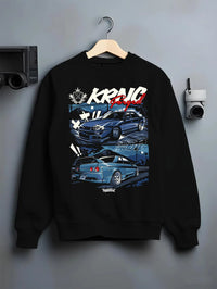 Black crewneck sweatshirt on a hanger against a grey wall, featuring Nissan Skyline R34 r34 skyline drift jdm legend racing graphic.