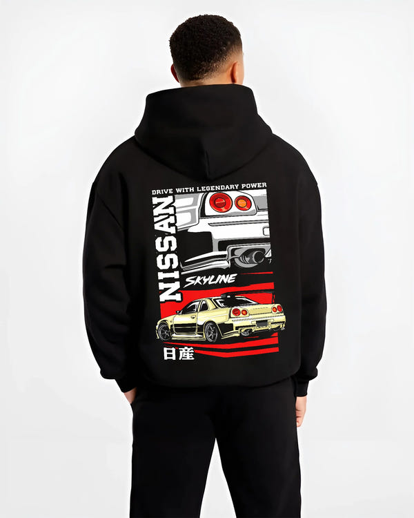 Black hoodie worn by a male model, back view, featuring Nissan Skyline R34 r34 skyline turbo drift jdm racing graphic.