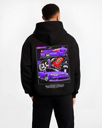 Black hoodie worn by a male model, back view, featuring Nissan 180SX racing drift jdm japanese tuning street graphic.