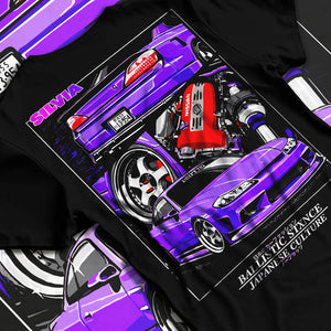 Black T-shirt laid flat with natural fabric folds, featuring Nissan 180SX racing drift jdm japanese tuning street graphic.