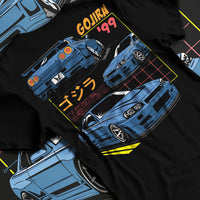 Black T-shirt laid flat with natural fabric folds, featuring Nissan Silvia S13 silvia turbo racing drift jdm japanese tuner graphic.