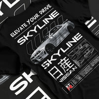 Black T-shirt laid flat with natural fabric folds, featuring Nissan PATROL turbo turbocharged tuner street classic racing graphic.