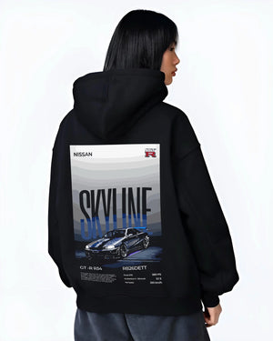 Black hoodie worn by a female model, back view, featuring Nissan Skyline R34 gt r r34 skyline rb26 jdm legend graphic.