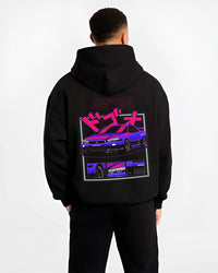 Black hoodie worn by a male model, back view, featuring Nissan Skyline turbo racing drift jdm japanese tuner stance street graphic.